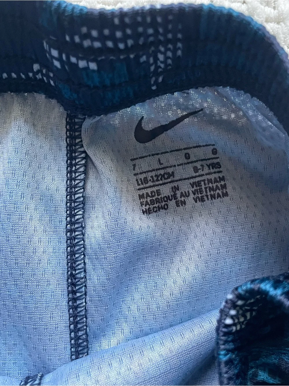 Nike Gray Tee with Blue Pixel Swoosh & Navy Patterned Shorts